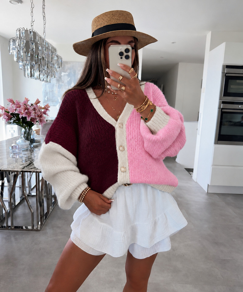 Gilet laine  oversize en maille color block à manches ballon et boutons dorés