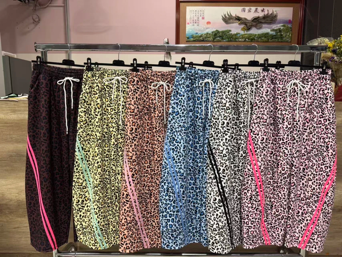 Leopard joggers with colorful side stripes 2
